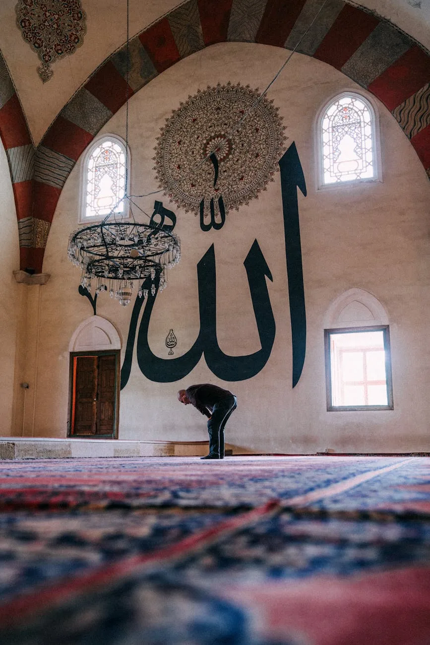 man praying inside a mosque